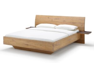 Eichenbett mit Schwebeoptik und integrierten Nachttischen