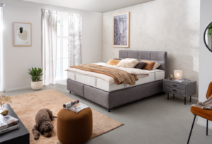 graues Boxspringbett in Lederoptik